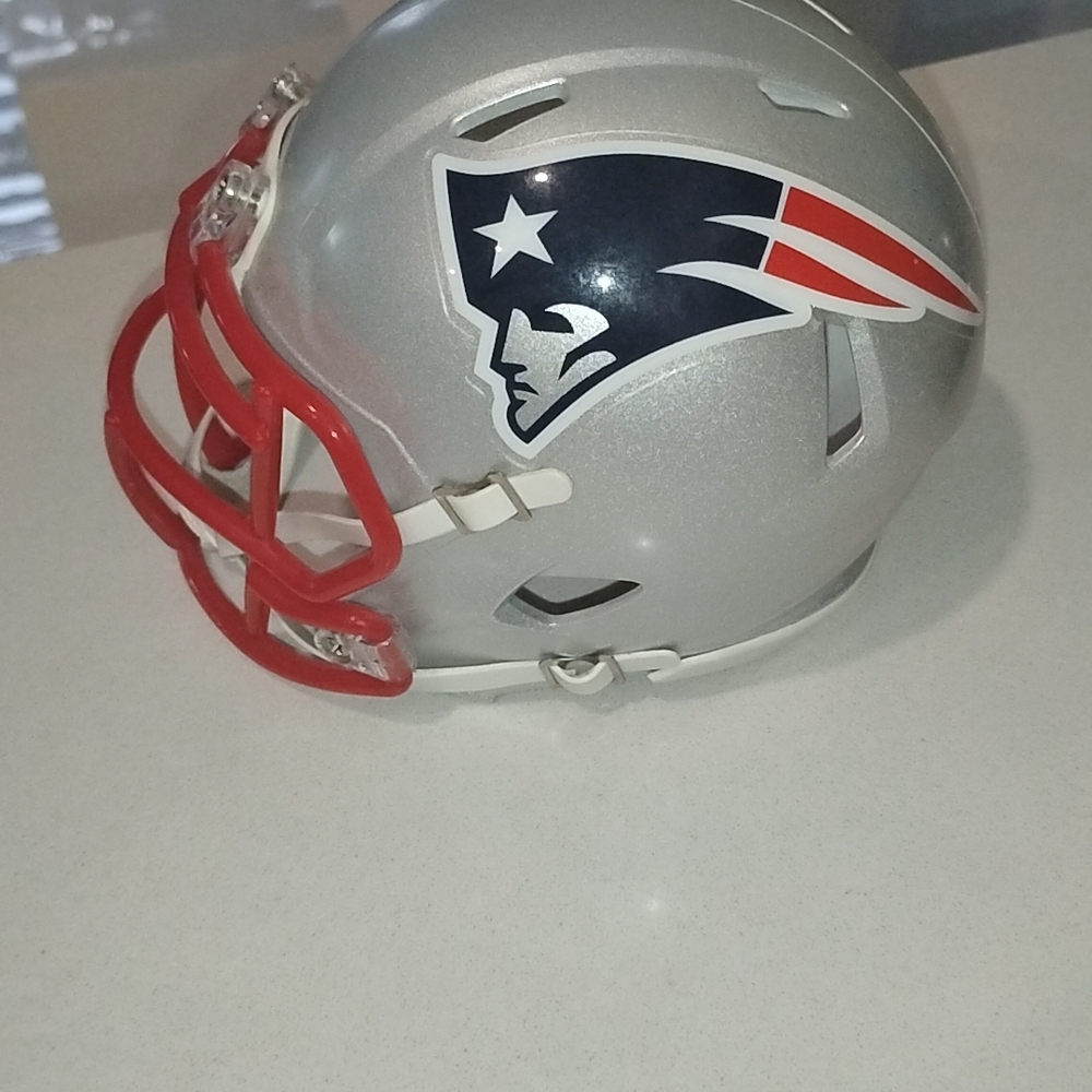 Silver Football Helmet with Red and Blue Accents